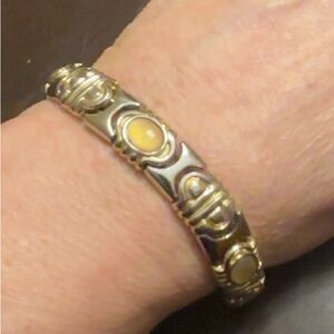 Butler signed Vintage Gold tone and Silver tone with yellow stones in bracelet.